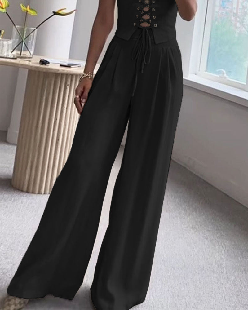 Romina - Zweiteiliges Ensemble mit einem Oberteil zum Binden mit schmalen Trägern und einer fließenden weiten Hose