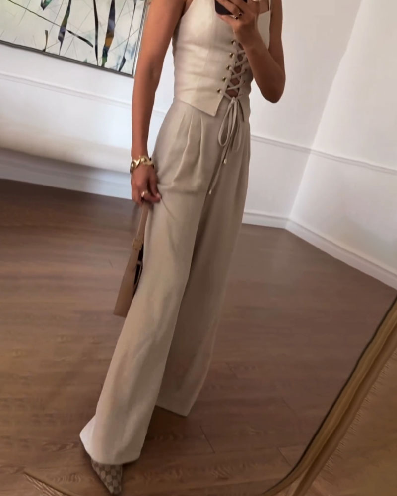 Romina - Zweiteiliges Ensemble mit einem Oberteil zum Binden mit schmalen Trägern und einer fließenden weiten Hose