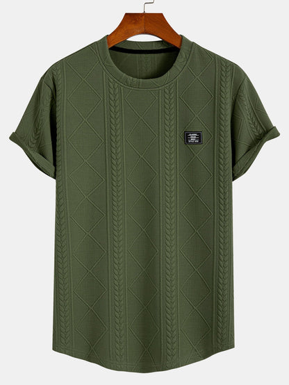 Kurzarm-T-Shirt mit geometrischem Jacquard-Muster und gebogenem Saum