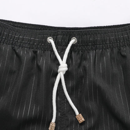 Schnelltrocknende gestreifte Strandshorts