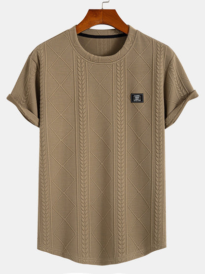 Kurzarm-T-Shirt mit geometrischem Jacquard-Muster und gebogenem Saum