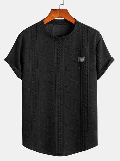 Kurzarm-T-Shirt mit geometrischem Jacquard-Muster und gebogenem Saum