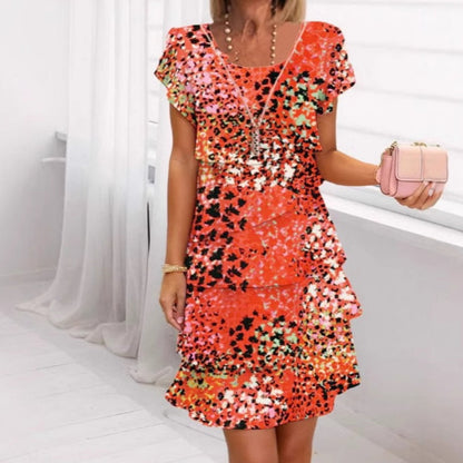 Eri - Buntes, vielseitiges und stilisiertes Paillettenkleid mit Leopardenprint